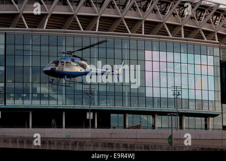 A helicopter stunt is used as part of the filming for 24 TV series at Wembley Football Stadium  Featuring: Atmosphere Where: London, United Kingdom When: 28 Apr 2014 Stock Photo