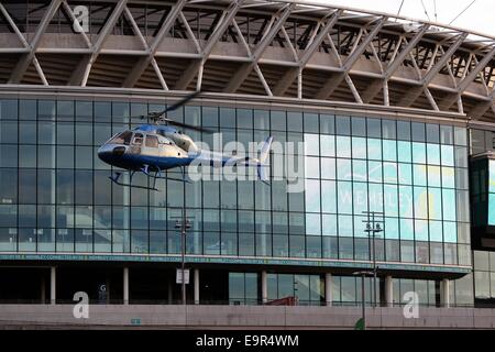 A helicopter stunt is used as part of the filming for 24 TV series at Wembley Football Stadium  Featuring: Atmosphere Where: London, United Kingdom When: 28 Apr 2014 Stock Photo