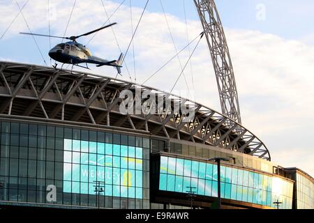 A helicopter stunt is used as part of the filming for 24 TV series at Wembley Football Stadium  Featuring: Atmosphere Where: London, United Kingdom When: 28 Apr 2014 Stock Photo