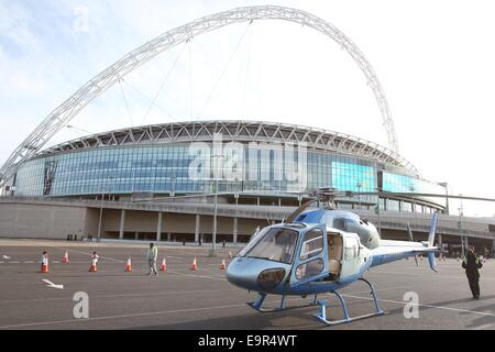 A helicopter stunt is used as part of the filming for 24 TV series at Wembley Football Stadium  Featuring: Atmosphere Where: London, United Kingdom When: 28 Apr 2014 Stock Photo