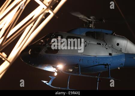 A helicopter stunt is used as part of the filming for 24 TV series at Wembley Football Stadium  Featuring: Atmosphere Where: London, United Kingdom When: 28 Apr 2014 Stock Photo