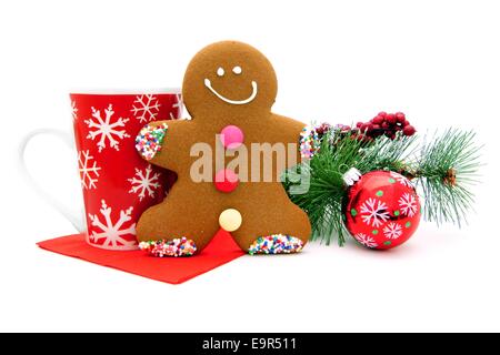 Christmas gingerbread man with festive mug and decor Stock Photo