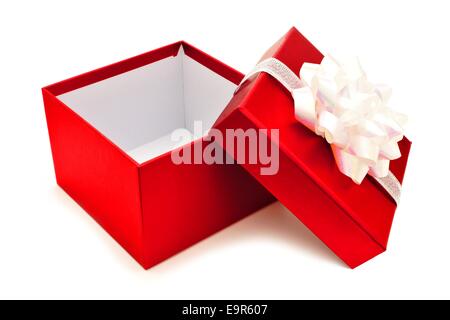 Opened red Christmas gift box with white bow and ribbon Stock Photo