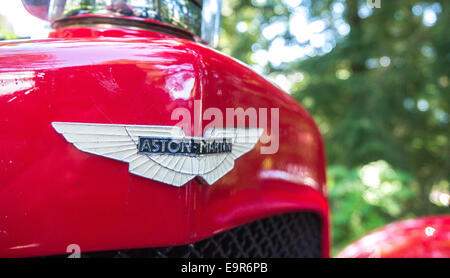 Close up of a classic Aston Martin logo badge Stock Photo