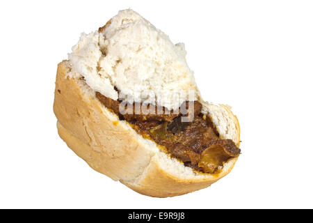 traditional south africal mutton bunny chow on white Stock Photo