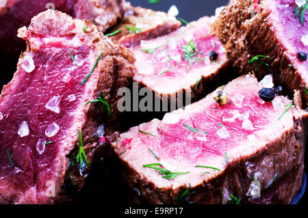 Sliced ​​beef steak on a plate with beans Stock Photo