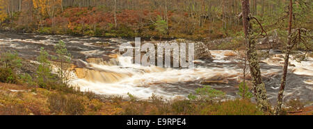 River Blackwater in Spate after heavy Autumn rains panoramic Stock Photo