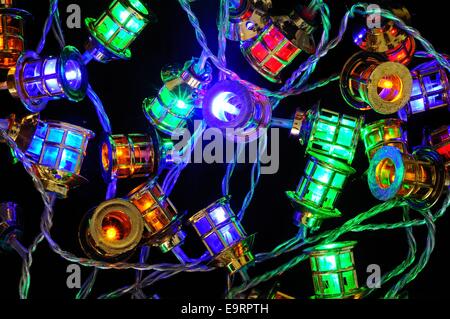 Modern Christmas LED Lantern lights against a black background. Stock Photo