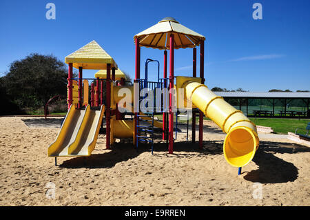 Modern playground on a sandy area in Michael Crotty Bicentennial Park, Ormond Beach, Florida Stock Photo