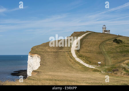Looking across the chalk headland and cliffs of Beachy Head to Belle Tout Lighthouse on England's south coast, East Sussex. Stock Photo
