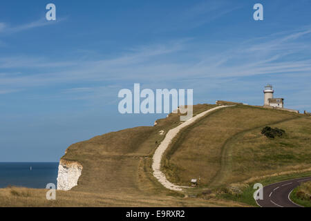 Looking across the chalk headland and cliffs of Beachy Head to Belle Tout Lighthouse on England's south coast, East Sussex. Stock Photo