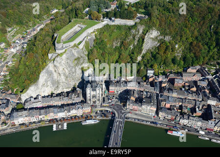 AERIAL VIEW. The medieval citadel overlooking the Collegiate Church of Notre Dame on the right bank of the Meuse River. Dinant, Wallonia, Belgium. Stock Photo