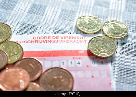 Payment order form with amount and euro coins closeup image Stock Photo