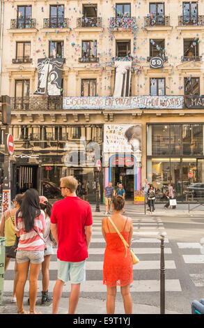 facade of the art studio house and gallery chez robert, electron libre decorated with gloves and posters, rue rivoli,  paris Stock Photo