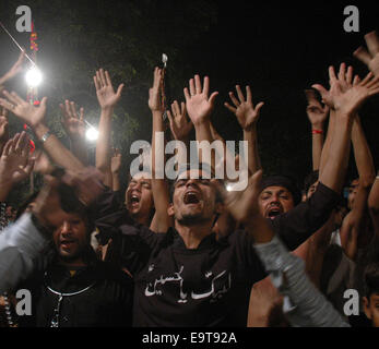 Lahore. 2nd Nov, 2014. Pakistani Shiite Muslims attend a procession on the 7th day of Muharram in eastern Pakistan's Lahore, Nov. 2, 2014. The month of Muharram is the first month of Islamic calendar. Credit:  Sajjad/Xinhua/Alamy Live News Stock Photo