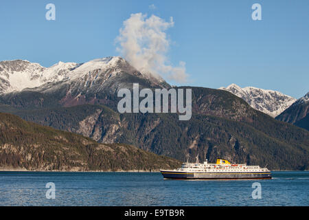 Southeast Alaskan ferry in the Lynn Canal near Haines on a sunny fall day. Stock Photo