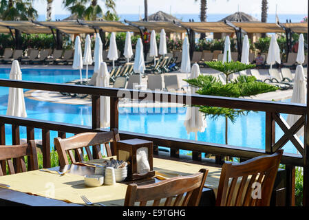 Cosy cafe with beautiful pool Stock Photo