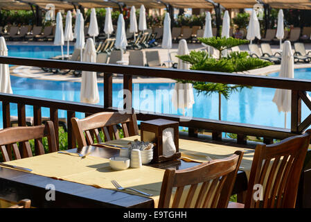 Cosy cafe with beautiful pool Stock Photo