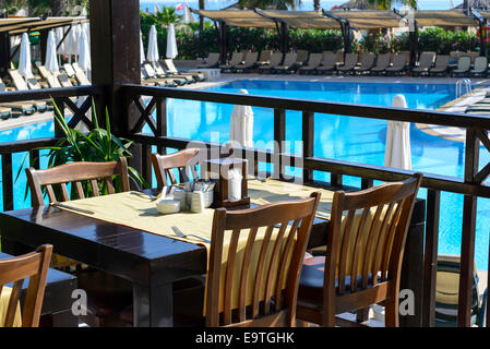 Cosy cafe with beautiful pool Stock Photo