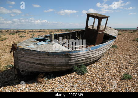 Old Fishing Boat sitting on the Beach Stock Photo - Alamy