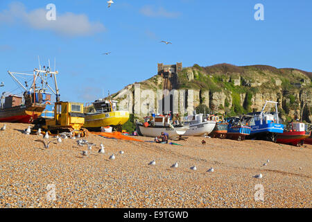 Hastings Fishing Boats on the Old Town Stade beach. Hastings has the biggest beach launched fishing fleet in Britain and Europe. Stock Photo