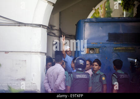 Dhaka, Bangladesh. 2nd Nov, 2014. Bangladesh Jamaat-e-Islami leader Mir Quasem Ali shows victory sign before leave the court in a prison van today. The International Crimes Tribunal-2, chaired by Justice Obaidul Hassan sentenced Bangladesh Jamaat-e-Islami leader Mir Quasem to hang till death on Sunday, nearly six months after the case was wrapped up. The court said in its verdict that eight of the 14 charges leveled against him had been proven while two were partially proven. Under his command local collaborators of Pakistan army let loose a reign of terror in Chittagong during the Bangladesh Stock Photo