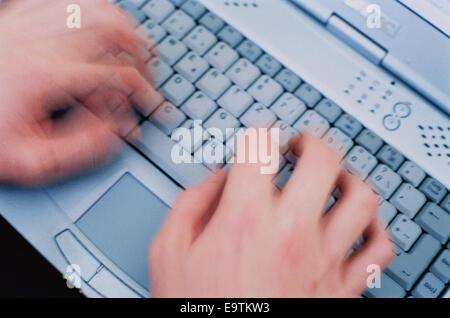 Person Typing on Laptop Stock Photo
