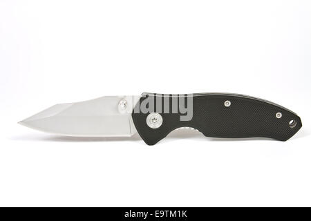 Folding pocket knife with a locking mechanism on a white background Stock Photo