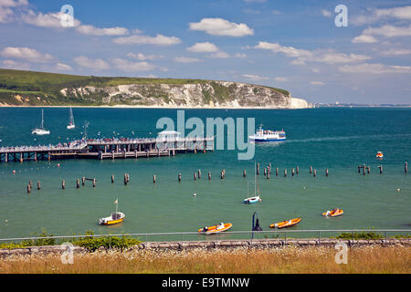 The 'Solent Scene' ferry from Poole arrives at the restored Victorian Pier in Swanage on the Jurassic Coast Dorset England UK Stock Photo