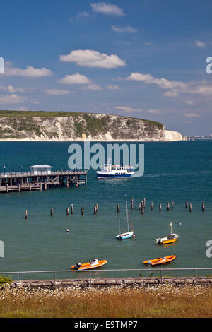 The 'Solent Scene' ferry from Poole arrives at the restored Victorian Pier in Swanage on the Jurassic Coast Dorset England UK Stock Photo