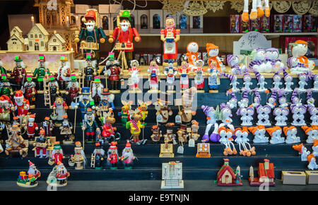 Traditional wooden carved figurines on sale, Christmas Market, Germany Stock Photo