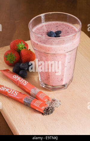 Strawberry, blueberry and chia seed smoothie. Stock Photo