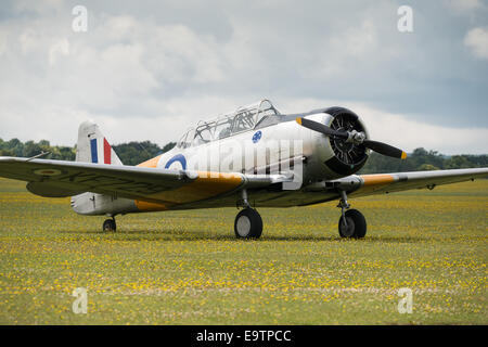 Duxford, UK - 13 July 2014:  World War 2 vintage North American Harvard trainer plane at Duxford Flying Legends Airshow Stock Photo