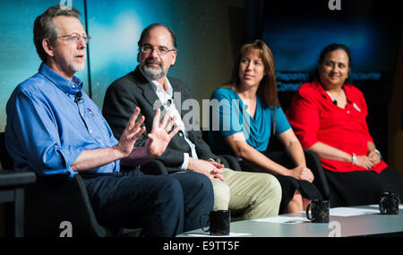 Jim Green, director, Planetary Science Division, NASA Headquarters, Washington, left, is seen with fellow panelists Carey Lisse,