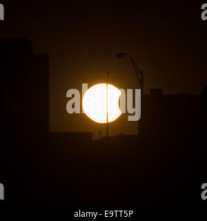 A partial solar eclipse occurred in Arlington, Virginia, on October 23, 2014, and was documented by NASA photographers, offering the public a safe chance to observe and study the celestial event. Stock Photo