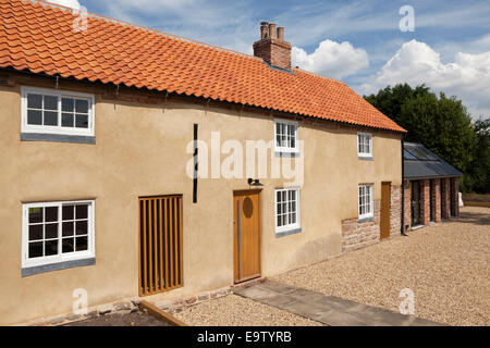 Cottages converted into one residential dwelling in a village in the U.K. Stock Photo