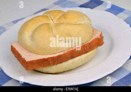 meat loaf in submarine sandwich on white plate, close up Stock Photo