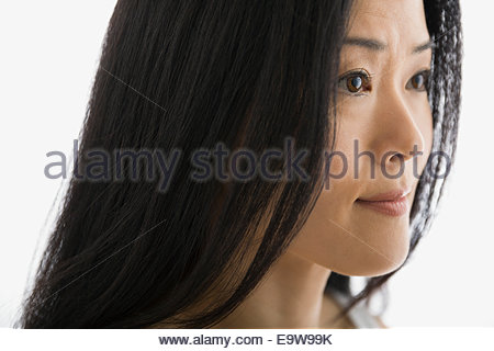 Close up portrait of pensive woman looking away