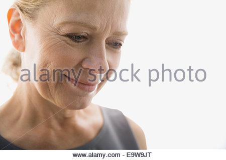 Close up portrait of smiling woman looking down