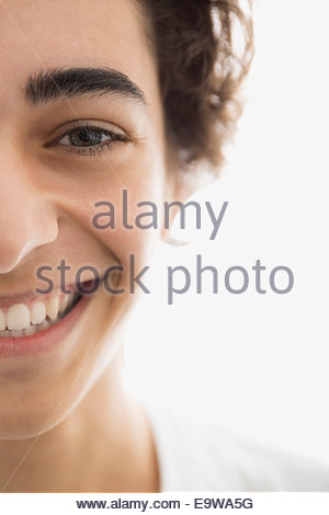 Close up portrait of enthusiastic young brunette man