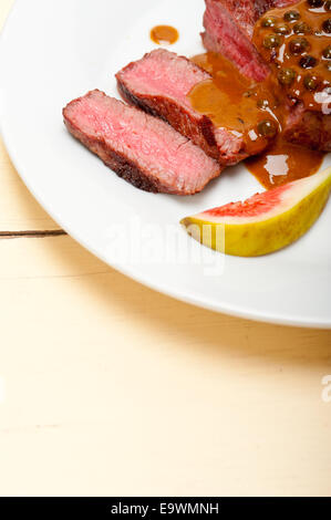 beef filet mignon with green peppercorn creamy sauce ou poivre vert Stock Photo