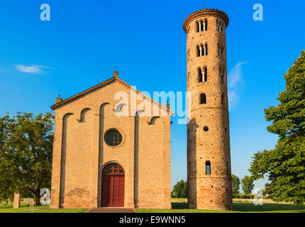 Medieval countryside church of Campanile with romanesque cylindrical bell tower, located in the village of Santa Maria in Fabriago in Emilia Romagna region in northern Italy Stock Photo