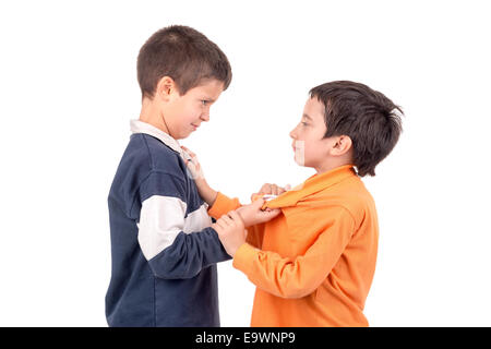 Girls bullying smaller boy at school modelled Stock Photo - Alamy