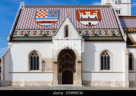 Main entrance to and tiled roof of St Mark's Church, Zagreb, Croatia Stock Photo