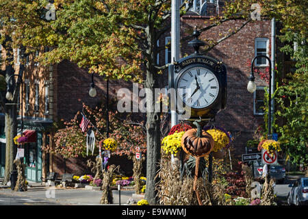 Town clock with autumn decorations, Sleepy Hollow, New York, USA Stock Photo