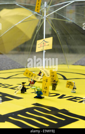 Hong Kong, China. 2nd November, 2014. Students, pro democracy activists and other supporters of Occupy Central, now called the umbrella movement or the umbrella revolution,remain in Mong Kok. Lego figures depicting key protest characters. Stock Photo