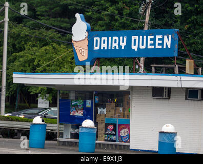 A Dairy Queen sign on top of an ice cream shop. Stock Photo