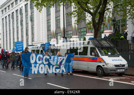 Occupy Wonga protest in Camden    Police block Occupy London and other anti-capitalist groups who attempted to occupy Greater London House, the offices of the payday loan company Wonga.  Featuring: Protest,Demonstration,Demo Where: London, England, United Kingdom When: 01 May 2014 Stock Photo