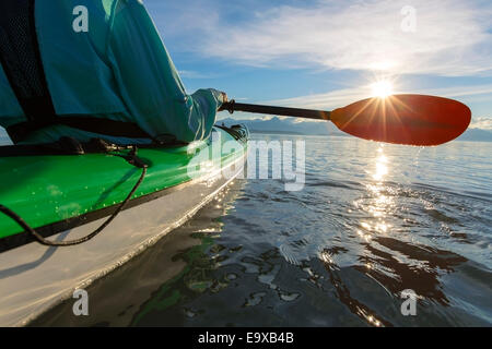 Sun,Kayak,Oar,Alaska,Senior Man,Lynn Canal Stock Photo