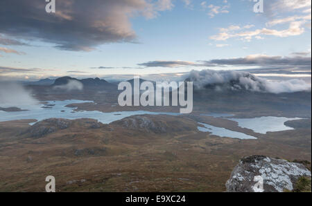 View from Stac Pollaidh over Inverpolly to cloud over Suilven and Cul Mor at dawn, Assynt, Sutherland, north west Scotland Stock Photo